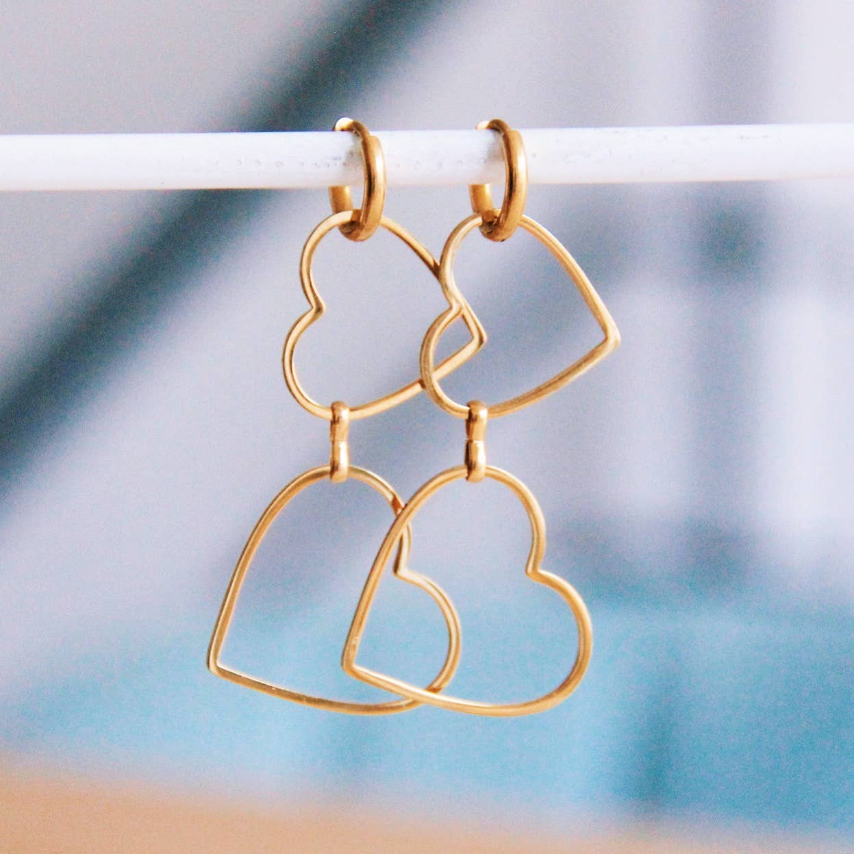 Earring with double heart